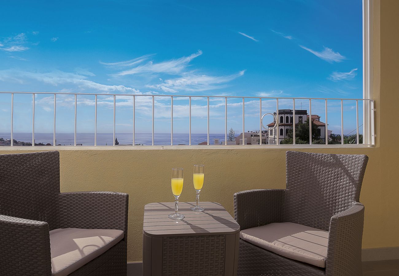 Funchal Window City Center House balcony with outdoor furniture