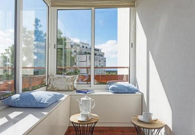 living room with tv in apartment in Funchal