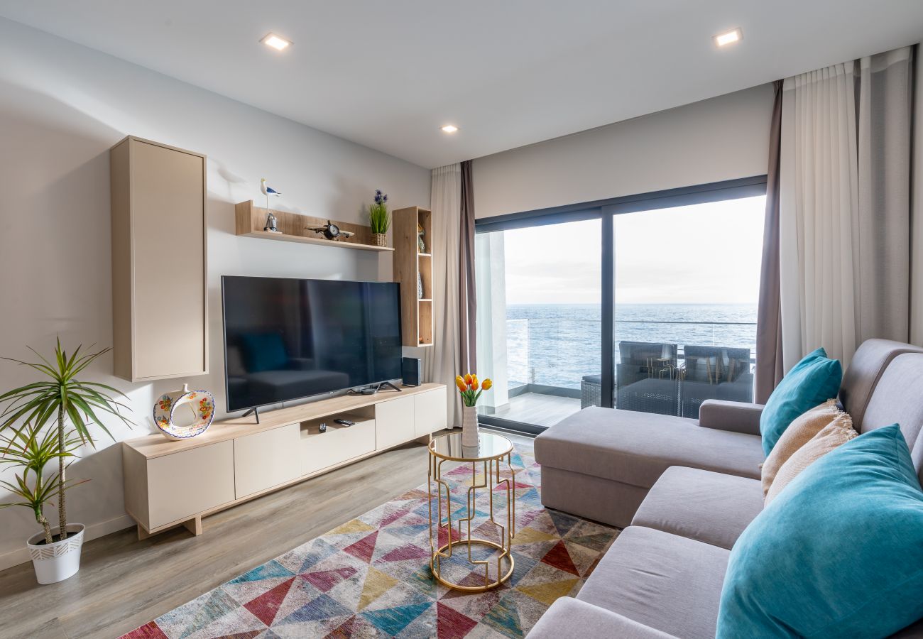 Apartment in Santa Cruz - Sea View Balcony by Madeira Sun Travel Living room furnished in a modern style with ocean views